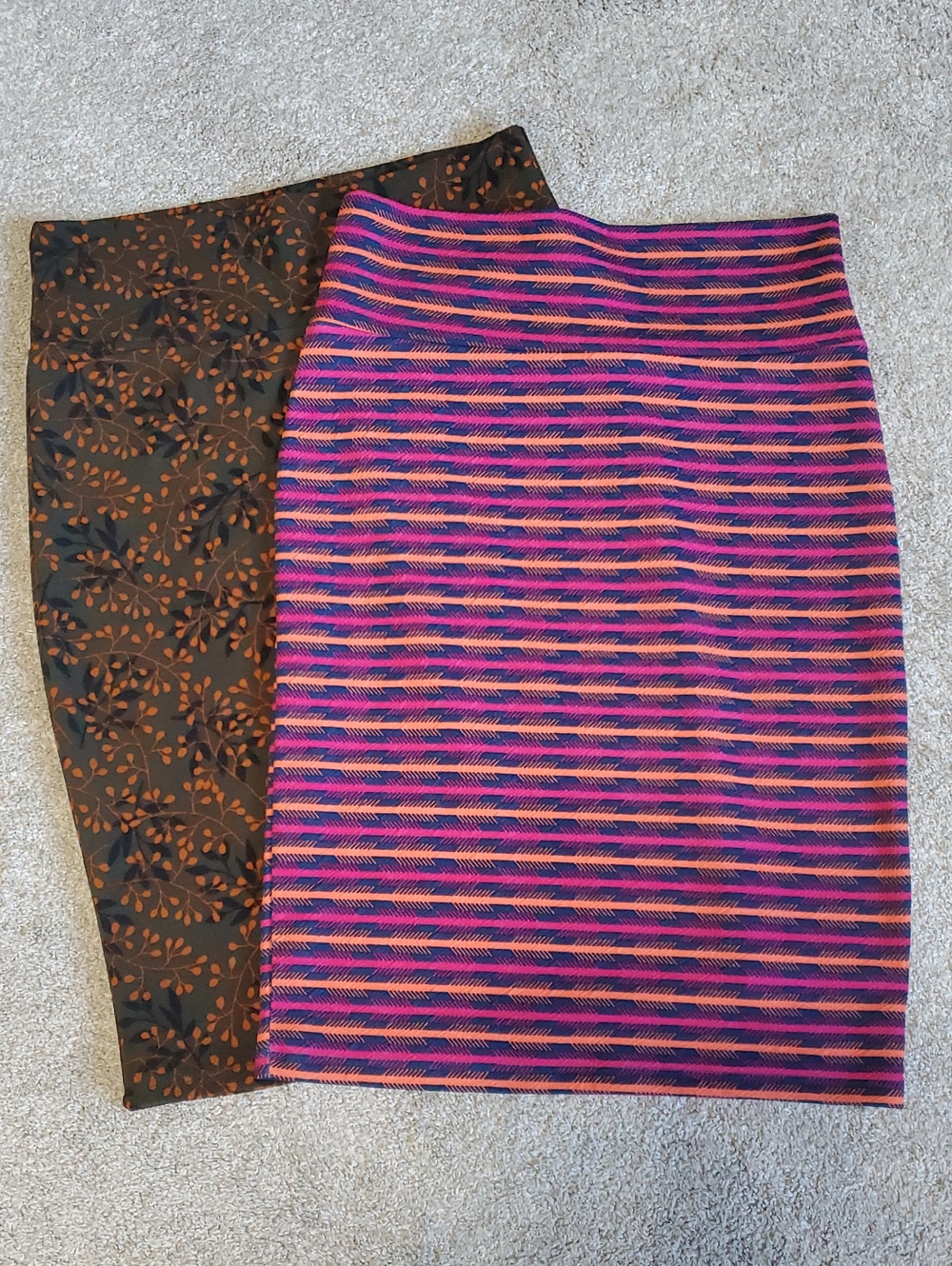 LuLaRoe Pink and Navy Striped, Green Ivy Floral Pencil Skirts. Both Medium